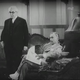 Rózsahegyi Kálmán, Rajnay Gábor a Varjú a toronyórán c. filmben. Rajnay gyakorta hordott kamáslit. És még ez is jól állt neki.